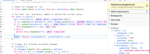 The JavaScript debugger is paused at a line of code where a property was set, due to a watchpoint on that property.
