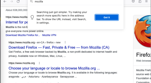 A Firefox window is shown with the search term "mozilla" in the URL bar. The search term is persisted there even though the results have been loaded already in the content area. The search input has some informational text below it saying: "Searching just got simpler. Try making your search more specific here in the address bar. To show the URL instead, visit Search, in settings."