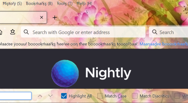 Firefox is shown with a non-default theme that has an image as a background. The image has lots of shifting colours a flowery motifs. The findbar is open at the bottom of the Firefox window, and the text input is focused.