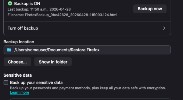 Firefox settings page showing the Backup feature in dark mode. Backup is enabled, with details of the most recent backup and a “Backup now” button. The page displays the backup file name and a backup location folder path, along with “Choose…” and “Show in folder” buttons. A “Sensitive data” section includes an option to back up passwords and payment methods with encryption, and a disabled “Change password” button.